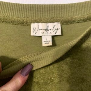 Blouse is very comfortable and soft. Like new. I lost weight, and don’t fit now.